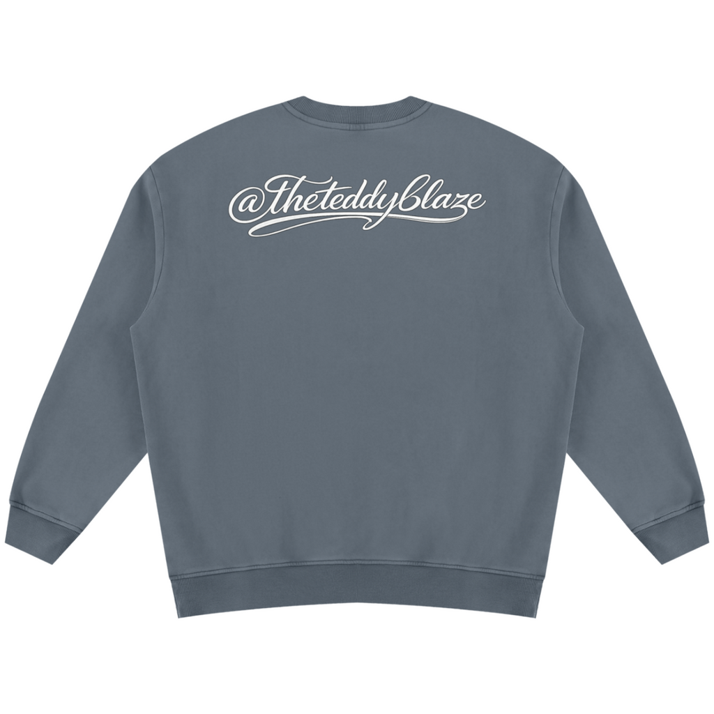 Shop the Signature Bearfather of Vegas Vintage Wash Fleece Jumper by Teddy Blaze. 355 GSM slate gray crewneck featuring brand personification The Bearfather from THE BLAZE MAN.