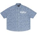 Shop the Signature Boxy Vintage Wash Denim Camp Shirt by Teddy Blaze. 230 GSM lightweight washed blue denim camp shirt with white script branding from HIGH ROLLERS OUTERWEAR.