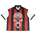 A short-sleeve soccer jersey with vertical red and black stripes, white sleeves, and a large white skull graphic on the front, shown against a plain white background.
