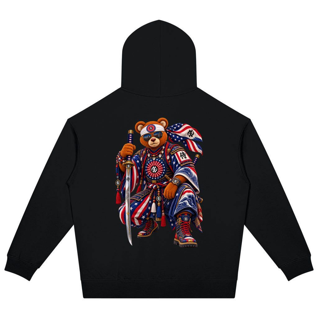 Shop the Teddy Blaze Rising oversized heavyweight hoodie featuring Gye Nyame and Teddy Blaze Samurai artwork in a bold Afrodemia Americana cultural fusion.