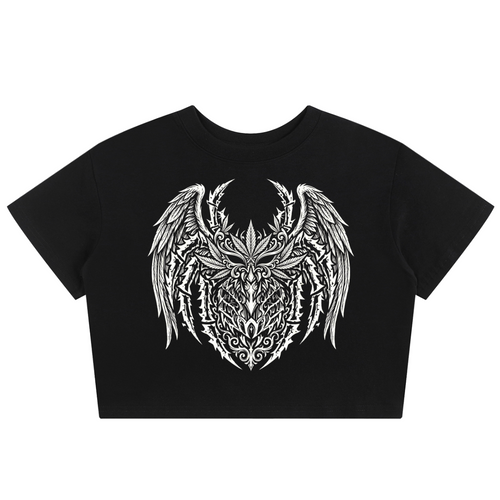 A black short-sleeve crop top t-shirt featuring a large white tribal-style graphic of a horned, winged creature on the chest, displayed against a solid white background.