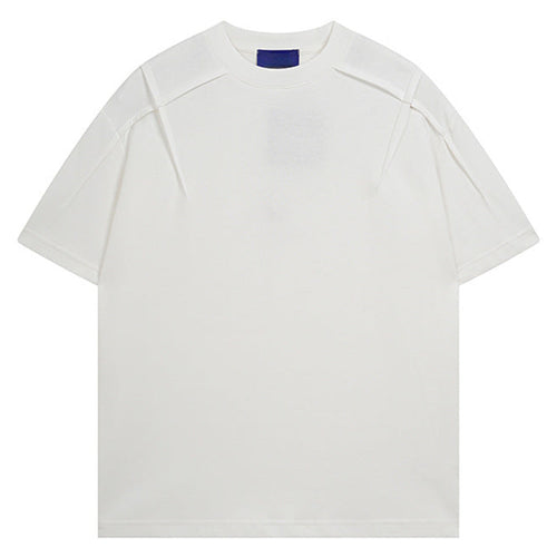 Shop the Architectural Pleat Drop Shoulder Tee by Teddy Blaze. Premium cotton-blend loose-fit t-shirt featuring diagonal chest pleat seams from THE IVY MAN.