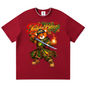 A red short-sleeve crewneck t-shirt featuring a colorful graphic of a teddy bear dressed in a green samurai kilt and holding a sword, with the text 'Teddy Blaze' above it.