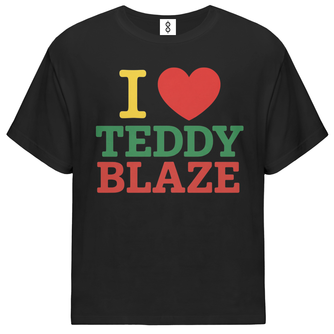 A black short-sleeve t-shirt with a graphic print reading 'I [heart] TEDDY BLAZE' in yellow, red, and green block letters, displayed on a solid white background.