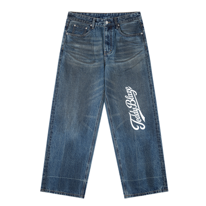 Men’s vintage wash denim jeans with a bold Signature leg graphic, heavyweight cotton-viscose denim, and BK Collection streetwear energy.