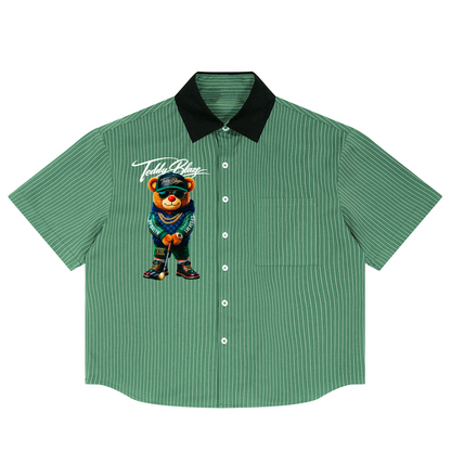 Green shirt with black collar featuring a bear graphic and text on a white background