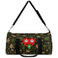 A duffle bag with a dark green and black camouflage pattern overlaid with tan and olive green cannabis leaves. The front features a red heart graphic containing two white cannabis leaves on top and a green marijuana leaf on the bottom.