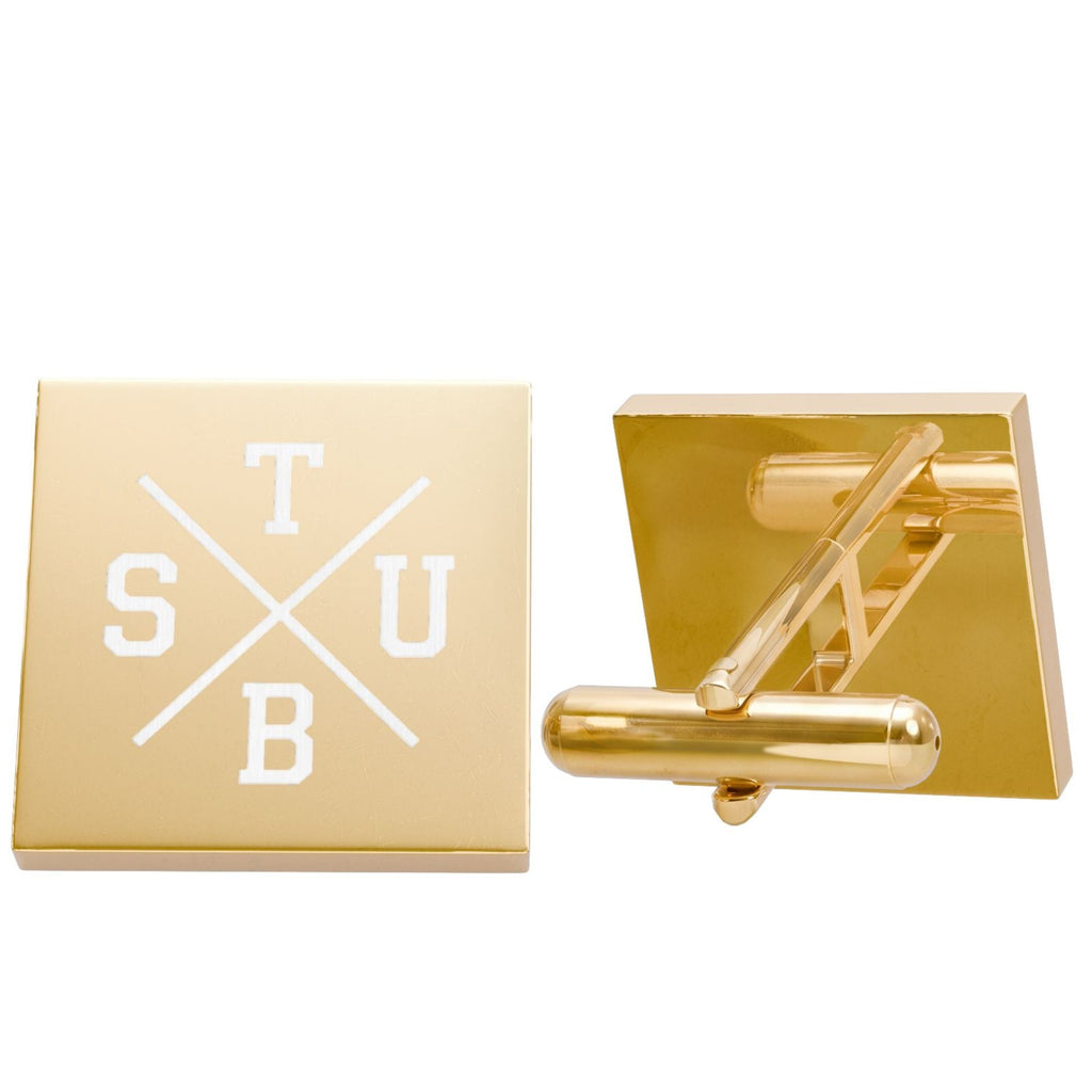 Gold cufflinks with baseball bat and ball design on a white background