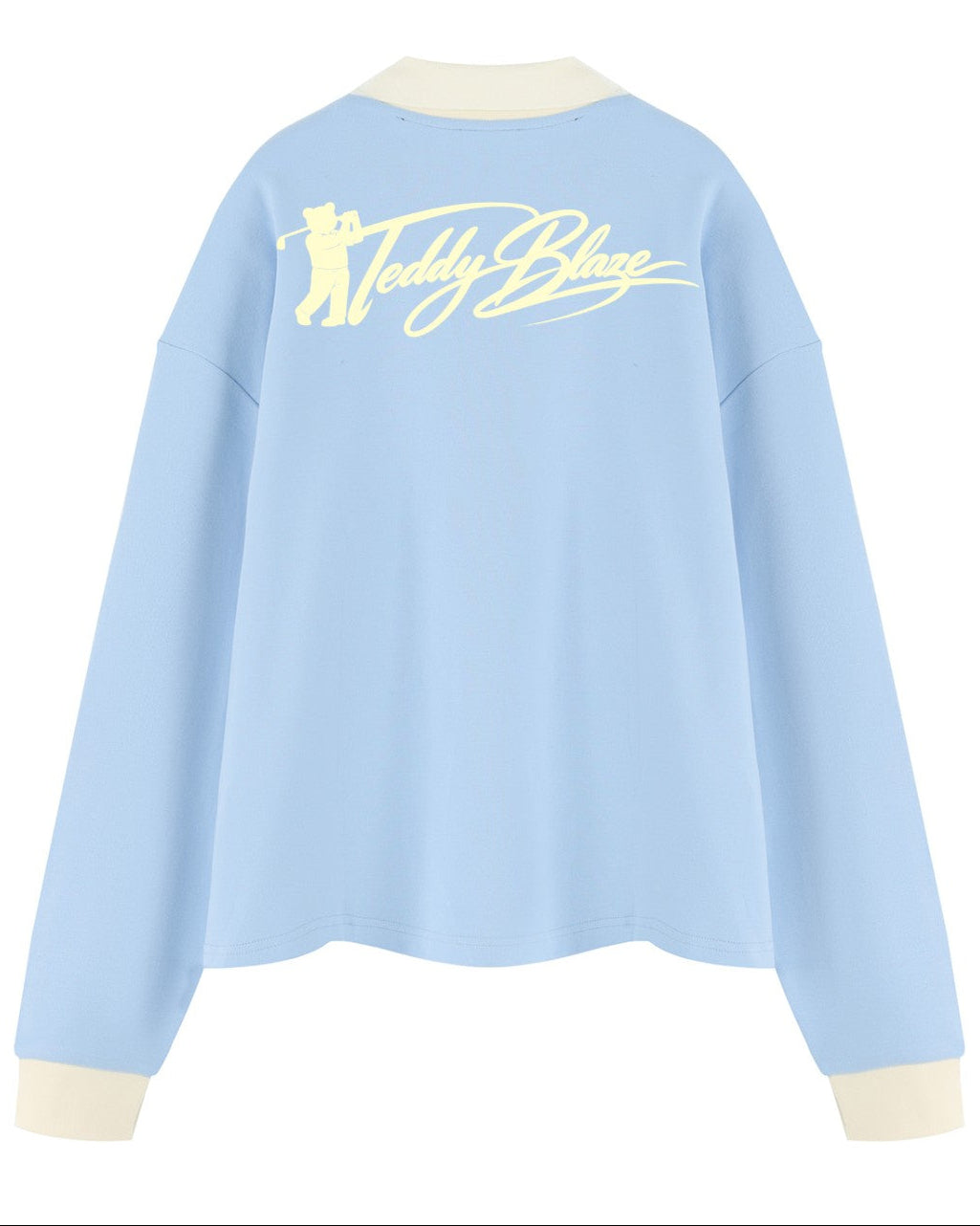Shop the Iron + Ivy Signature Golfer Contrast Trim Long Polo by Teddy Blaze. Heavyweight 320 GSM sky blue cotton-poly long-sleeve polo with cream contrast collar, cuffs, and signature bear golfer graphics.