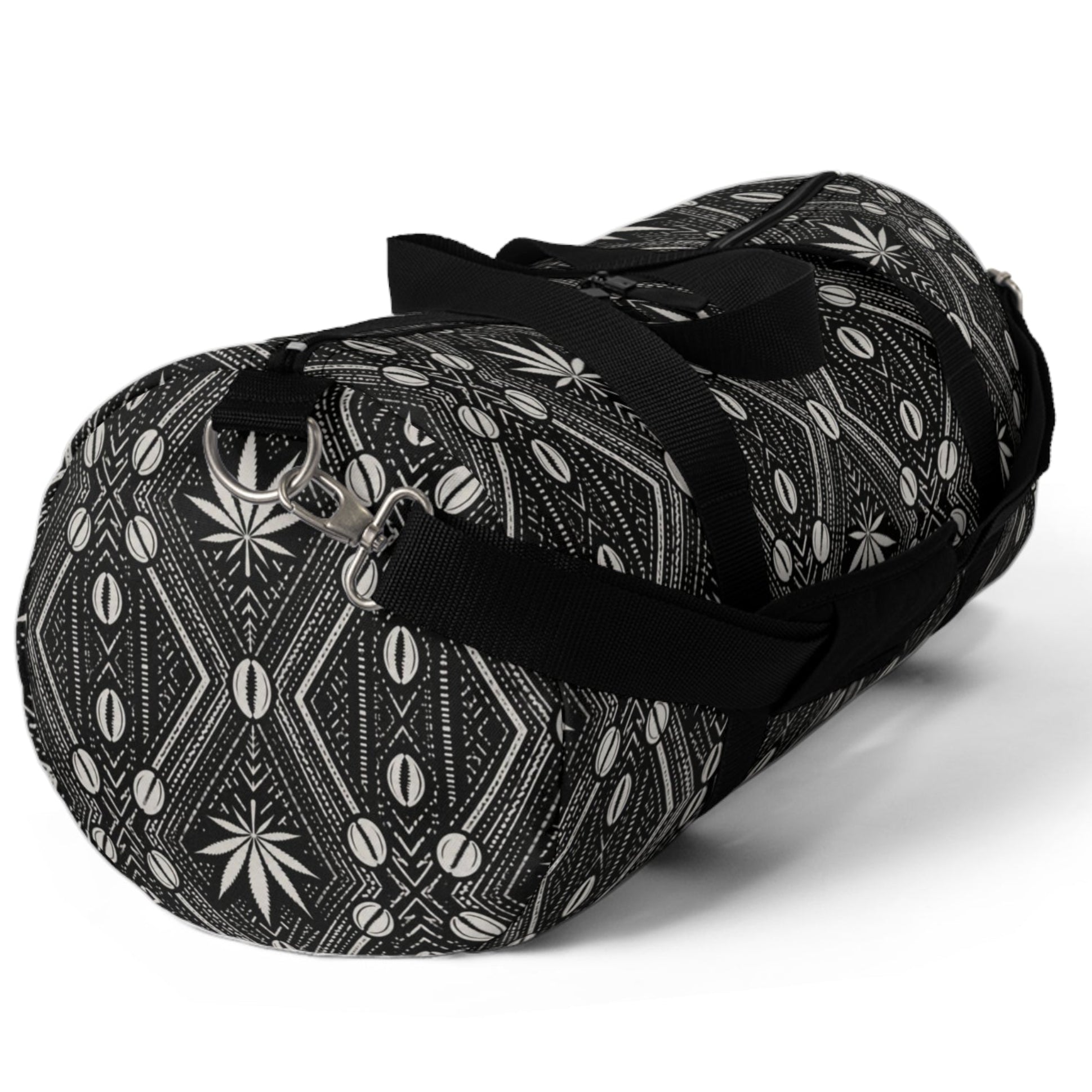 Meet the DaChek™ Getaway, a Teddy Blaze travel duffel featuring monochrome African-inspired patternwork, Oxford canvas, organized storage and an adjustable padded strap.
