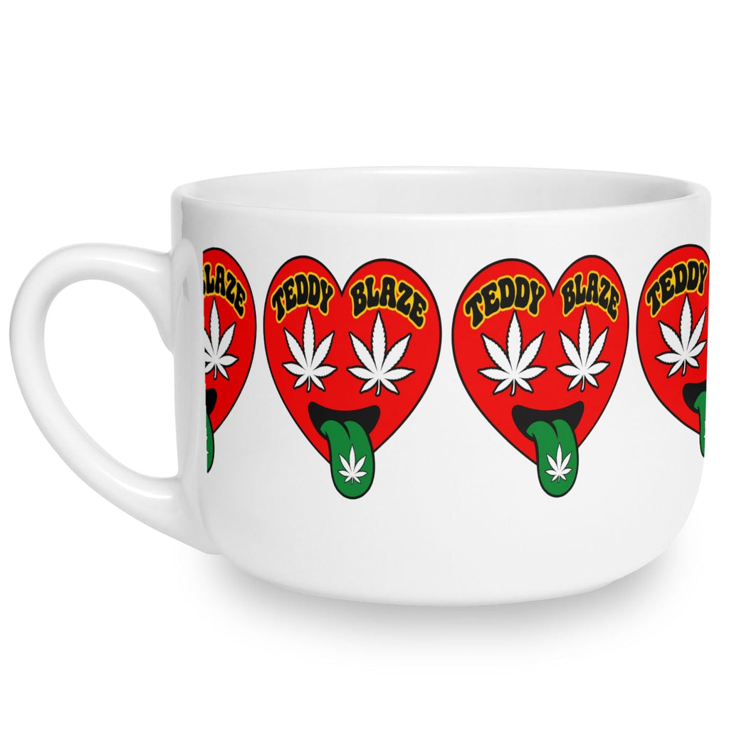 A white ceramic mug featuring a repeating graphic of red hearts with white cannabis leaves, green tongues, and the text 'TEDDY BLAZE' in yellow.