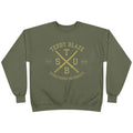 An olive green crewneck sweatshirt with a gold graphic on the chest reading 'TEDDY BLAZE' and 'STREETSHOO UNIVERSITY' around crossed 'TSUB' letters, shown on a plain white background.