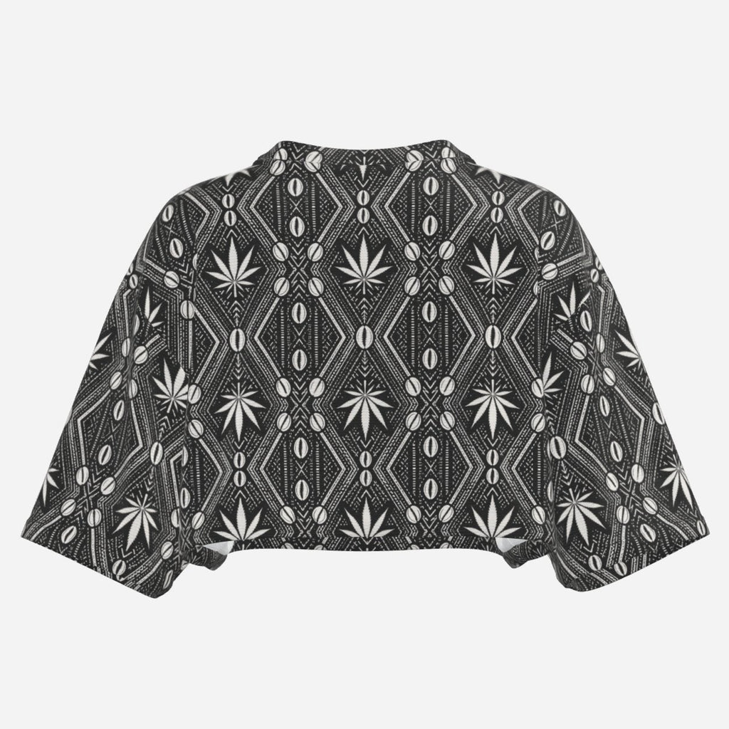 A lightweight DaChek™ crop top with a V-neckline, relaxed batwing sleeves, and stretch polyester fabric from Teddy Blaze.