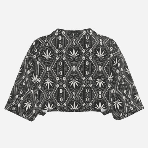 A lightweight DaChek™ crop top with a V-neckline, relaxed batwing sleeves, and stretch polyester fabric from Teddy Blaze.
