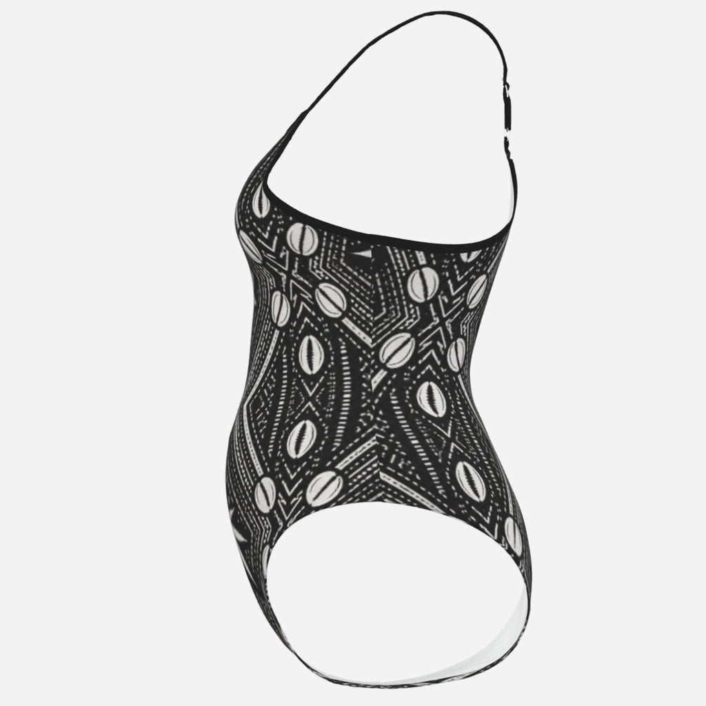 A Teddy Blaze™ spaghetti strap monokini in matte stretch swim fabric, finished with an open back and adjustable straps for poolside heat.