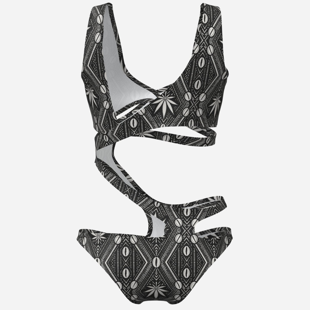 A bold DaChek™ cutout monokini in smooth matte stretch swim fabric, made for poolside confidence by Teddy Blaze.