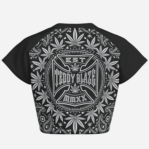 Black-and-white cropped raglan tee with a cotton-like feel, four-way stretch, TeddyFlora artwork and the DaCruz Cross by Teddy Blaze.