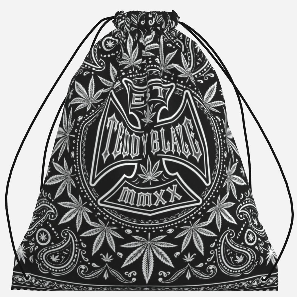 Lightweight black-and-white drawstring bag featuring the DaCruz Cross, TeddyFlora and paisley-inspired artwork by Teddy Blaze.
