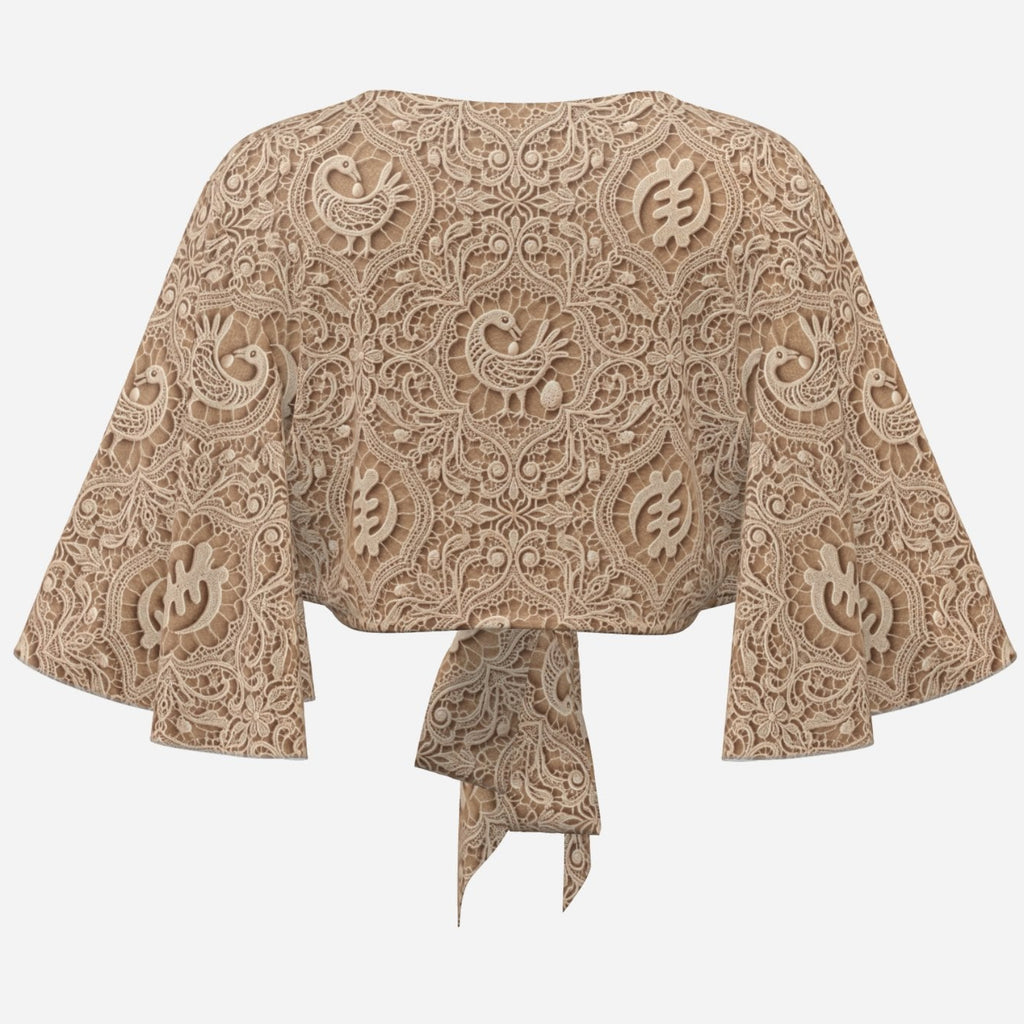 Earth-tone Teddy Blaze cropped wrap cover-up featuring trompe l'oeil lace, Sankofa motifs, flowing bat-wing sleeves and an adjustable tie front.