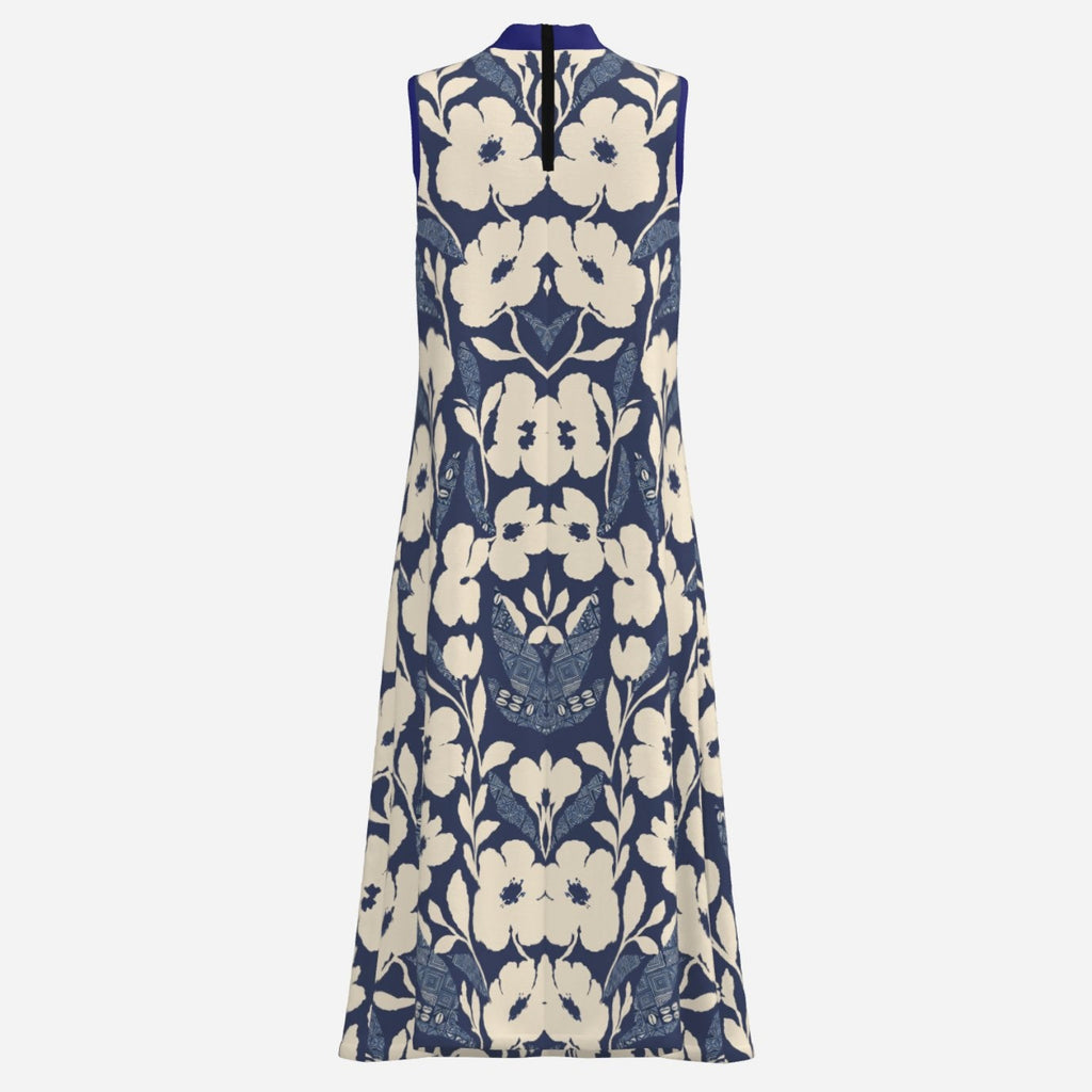 Teddy Blaze Adire floral A-line dress featuring an indigo and cream textile design, high neckline, ankle length silhouette, and Black Ivy elegance.