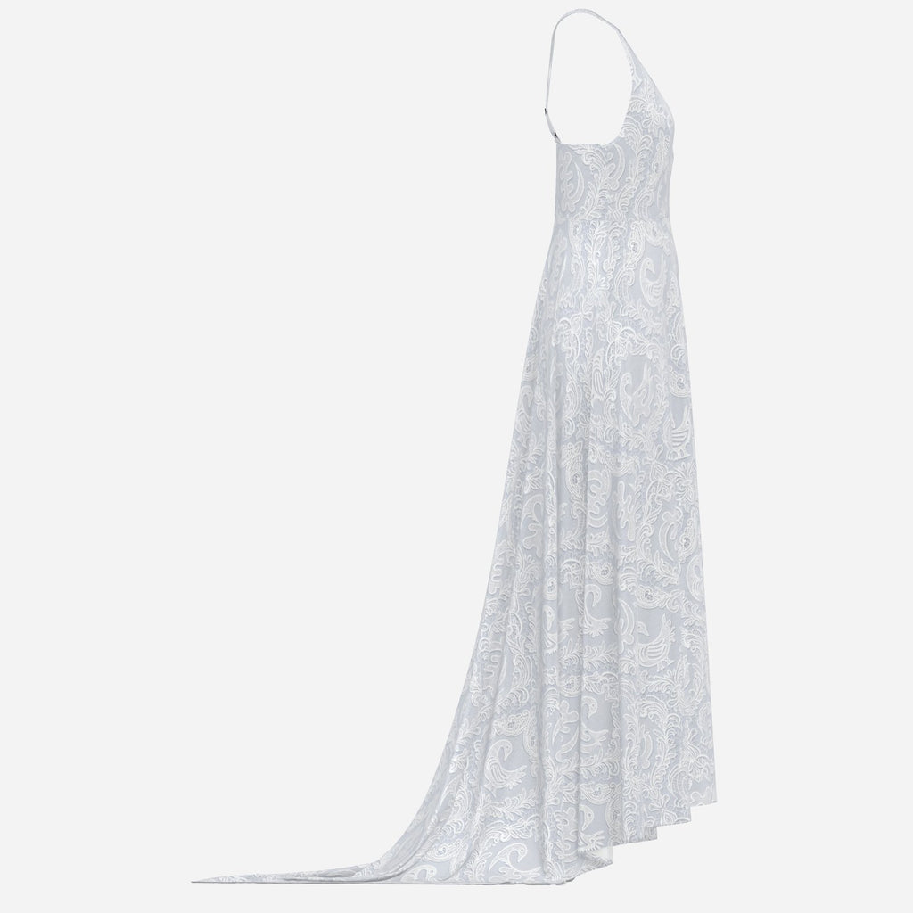 A statement Sankofa lace maxi dress featuring a deep V-neck, cross-back straps, and Teddy Blaze cultural textile design. Afrocentric luxury with modern fashion house energy.