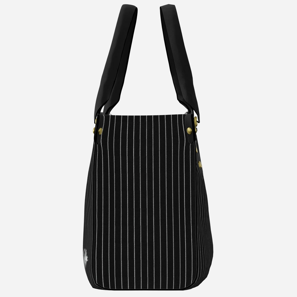 Shop the Signature Pinstripe Grab + Go Bag by Teddy Blaze. Structured leatherette carryall featuring vertical pinstripes and brass-tone hardware.