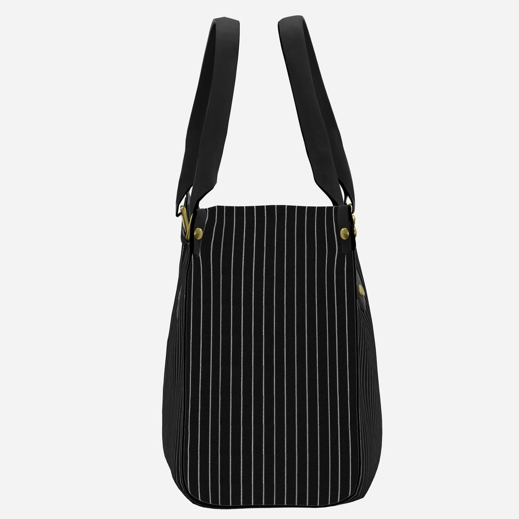 Shop the Signature Pinstripe Grab + Go Bag by Teddy Blaze. Structured leatherette carryall featuring vertical pinstripes and brass-tone hardware.