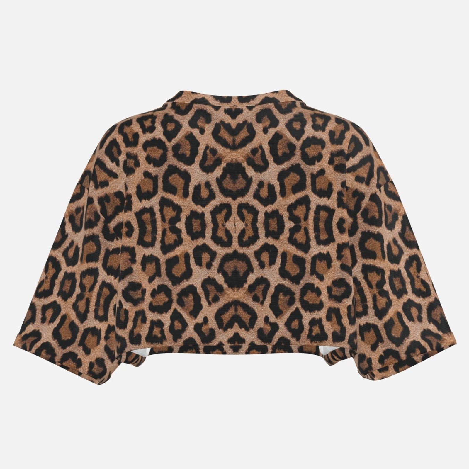 Shop the Zabu V-Neck Half Sleeve Crop Tee by Teddy Blaze. Silky-shine boxy crop top featuring an all-over leopard motif from THE IVY WOMAN collection.