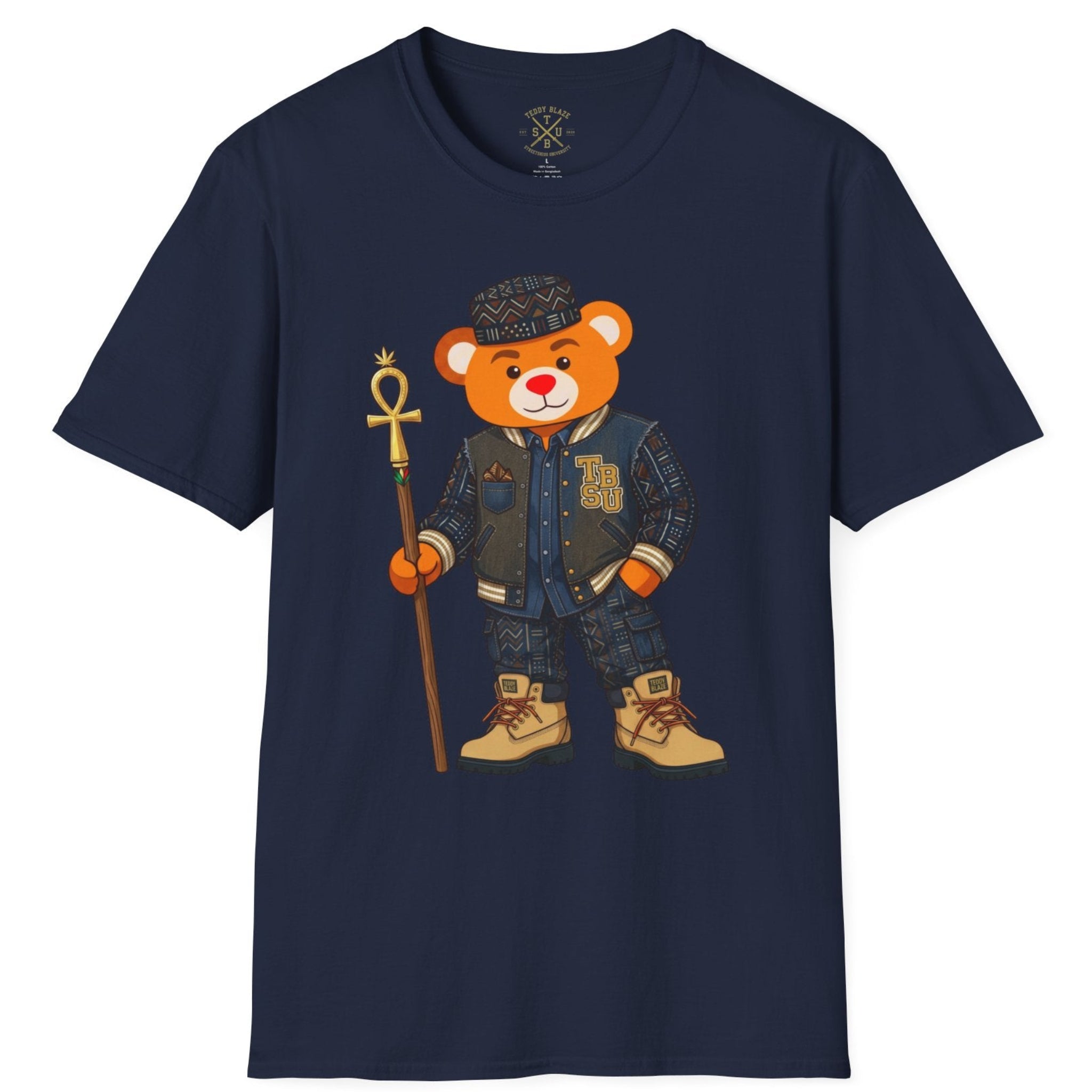 A navy blue short-sleeve t-shirt featuring a cartoon graphic of a teddy bear dressed in a denim jacket, jeans, and boots, holding a staff, displayed on a solid white background.