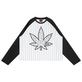 A long-sleeve raglan shirt with a white body featuring thin black pinstripes, black sleeves, and a large distressed black cannabis leaf graphic printed on the chest.