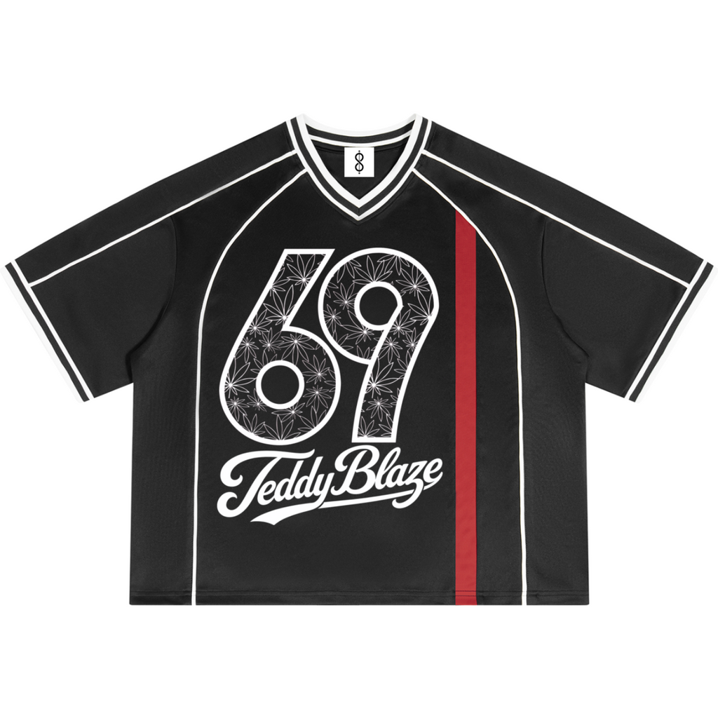 A black short-sleeve V-neck t-shirt with white piping, featuring a large white '69' graphic with a sketch pattern, the text 'Teddy Blaze' in white script, and a vertical red stripe on the right side.