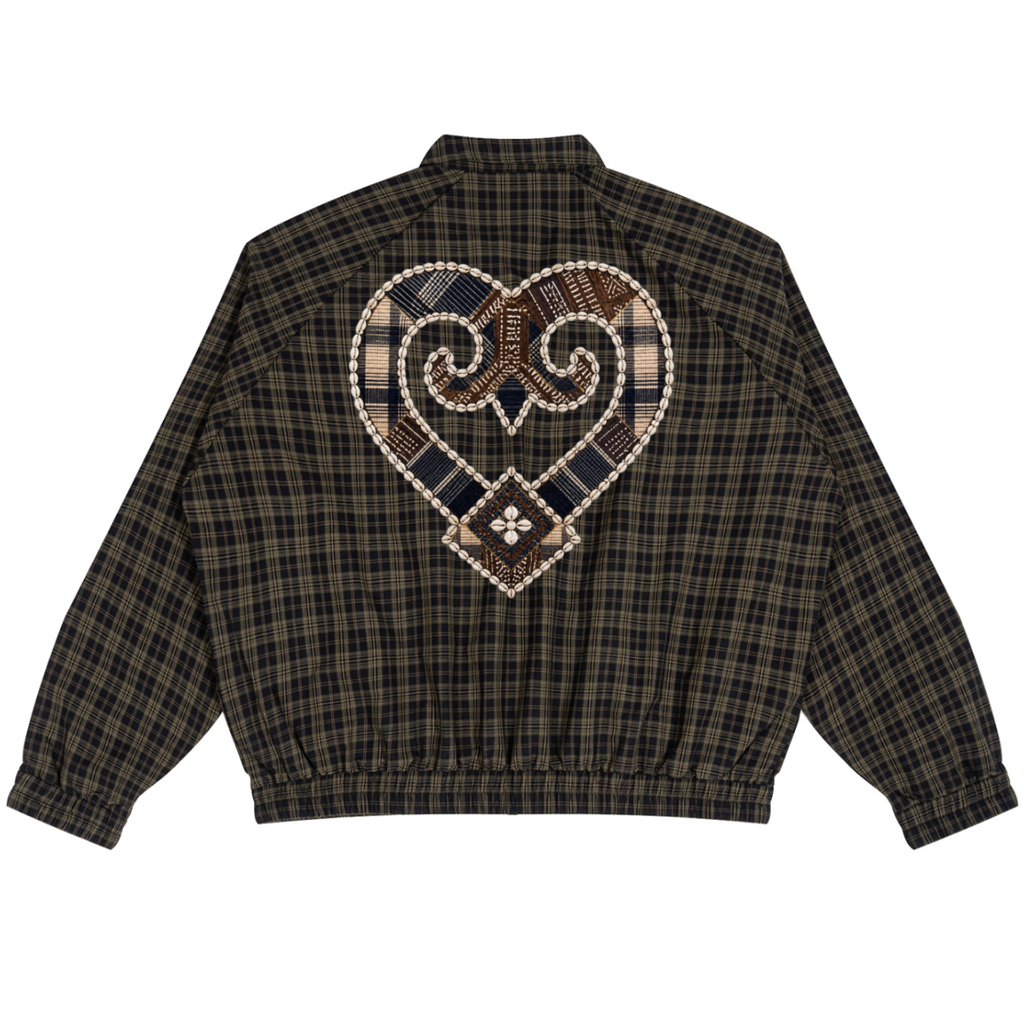 A dark brown and black plaid jacket shown from the back, featuring a large heart-shaped patchwork design in beige, brown, and navy with a central floral motif.