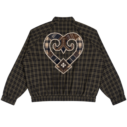 A dark brown and black plaid jacket shown from the back, featuring a large heart-shaped patchwork design in beige, brown, and navy with a central floral motif.
