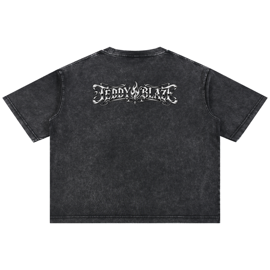 Shop the Fuego Cruz Mineral Washed Cotton Tee by Teddy Blaze. Heavyweight 275 gsm snow-wash cotton t-shirt with the DaCruz front crest and upper back gothic logo.