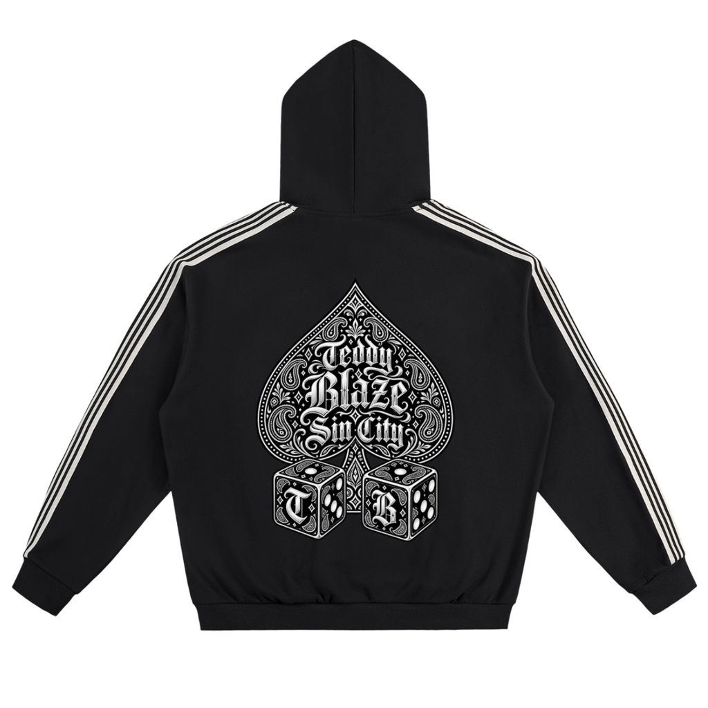Elevate your athletic layering with the House of Teddy Blaze High Roller Side Stripe Fleece Hoodie. Black 350 gsm fleece, contrast side stripes, graffiti chest logo, and Ace of Spades back graphic. Shop NYC to Vegas style.