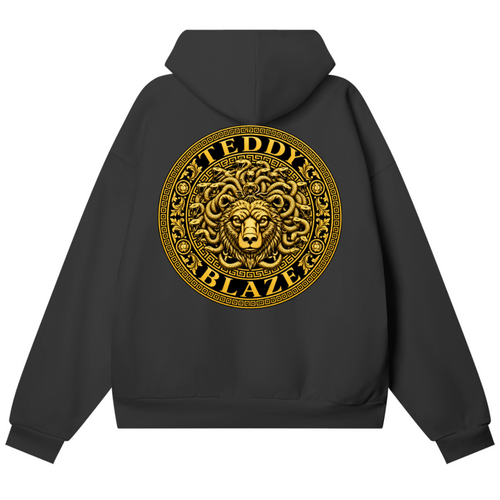 Elevate your cold-weather layers with the House of Teddy Blaze Beardusa Hidden Pocket Fleece Hoodie. Black 460 gsm fleece, hidden side pockets, gold block lettering, and gold Medusa bear graphic. Shop NYC to Vegas style.