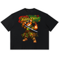 A black short-sleeve t-shirt with a colorful graphic of a cartoon bear wearing a green and gold Hawaiian shirt and holding a sword and flame, under the text 'Teemu Blaze'.