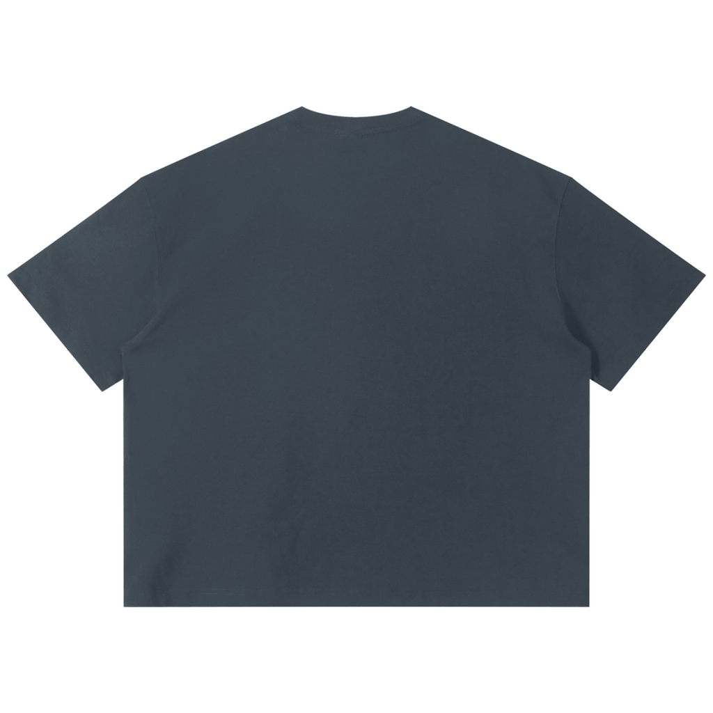 Shop the Signature Boxy Tee by Teddy Blaze. 220 GSM cotton-poly oversized drop-shoulder t-shirt with yellow script logo from TOPS BY TEDDY BLAZE.