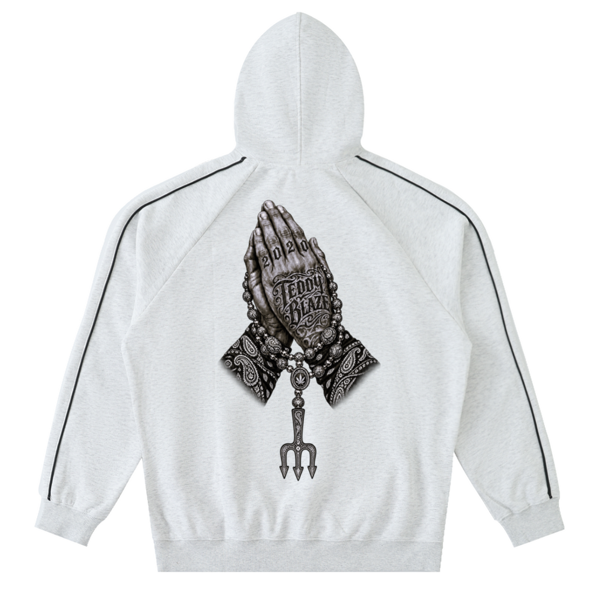Elevate your cool-weather layers with the Teddy Blaze Sin City Contrast Piping Raglan Hoodie. Oatmeal fleece, contrast piping, Sin City front print, and tattoo back graphic. Shop NYC to Vegas style.