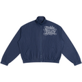A navy blue pinstriped zip-up jacket with a stand collar, featuring a white 'Teddy Blaze' logo printed on the left chest, displayed on a clean white background.