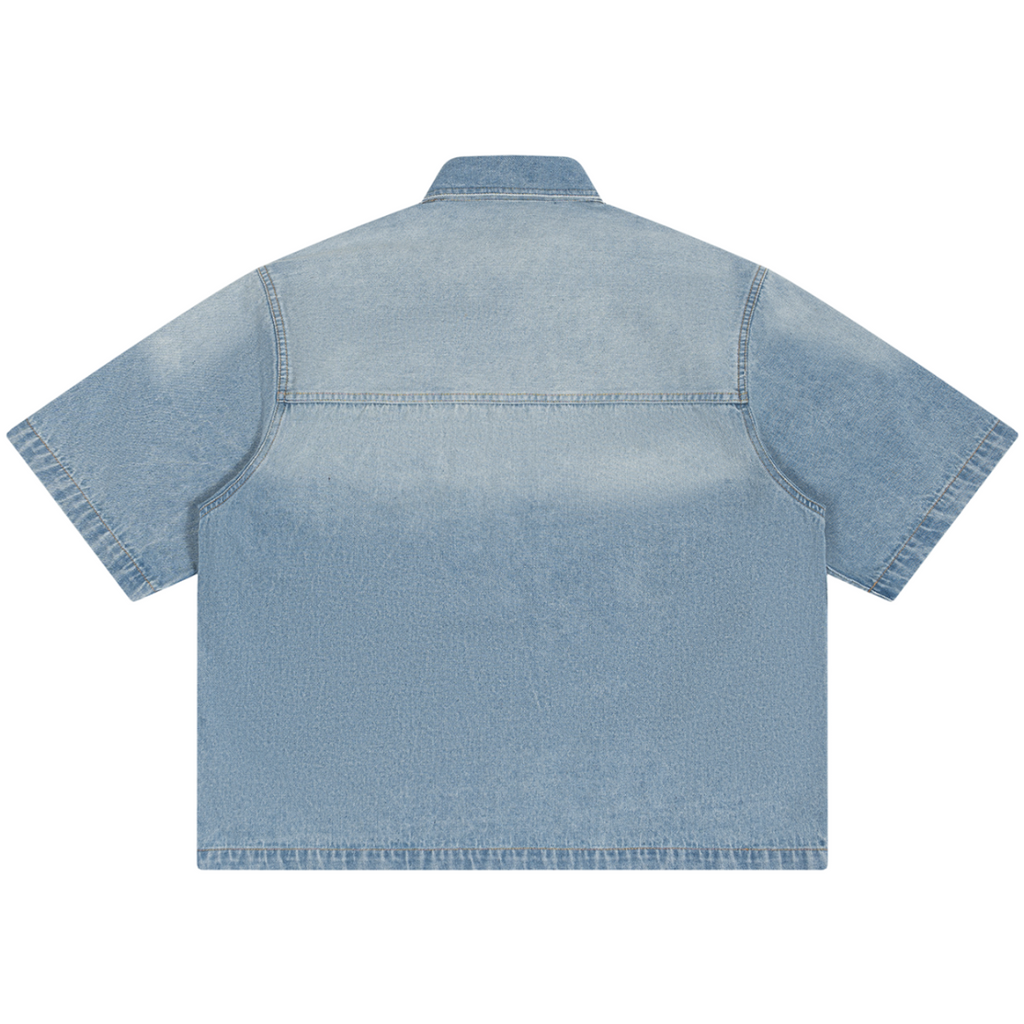 Shop the Signature Cachet Vintage Wash Boxy Short Denim Camp Shirt by Teddy Blaze. 320 GSM light wash denim short sleeve shirt featuring western yoke and Cachet emblem from The Mature Mocha Collection.