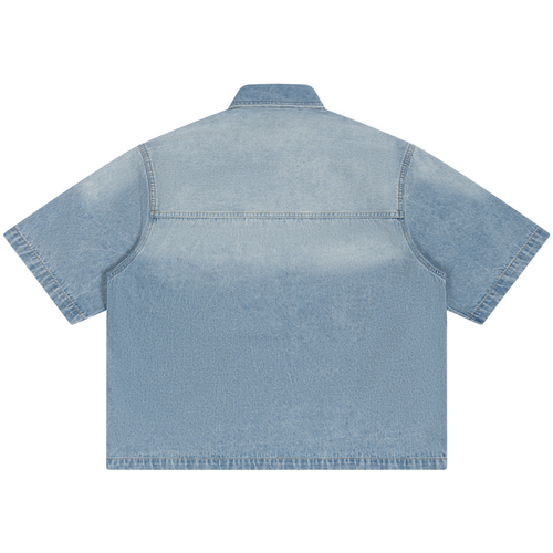 Shop the Signature Cachet Vintage Wash Boxy Short Denim Camp Shirt by Teddy Blaze. 320 GSM light wash denim short sleeve shirt featuring western yoke and Cachet emblem from The Mature Mocha Collection.