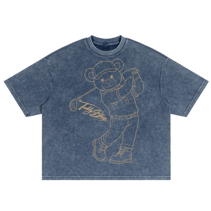 Blue t-shirt with a bear graphic and 'FILA' branding on a white background