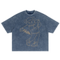 Blue t-shirt with a bear graphic and 'FILA' branding on a white background