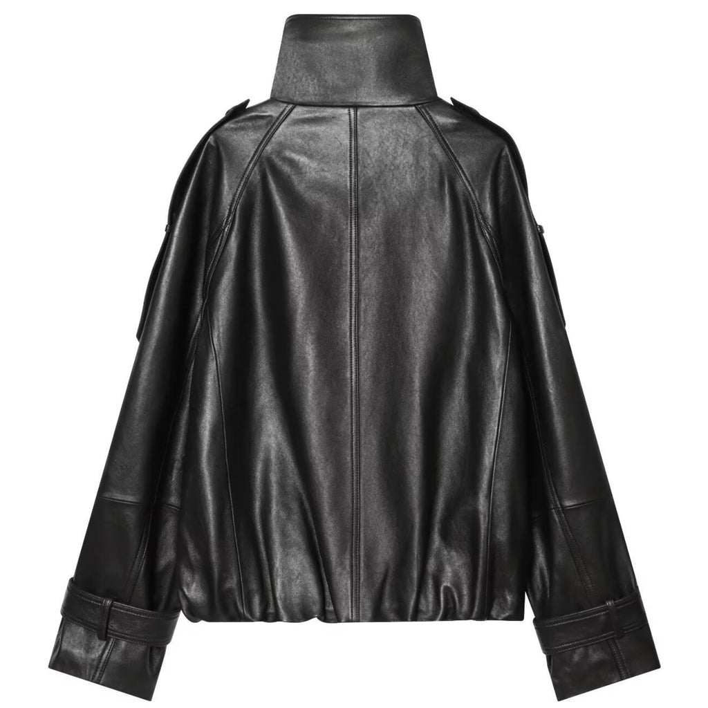 Shop the Iron + Ivy Double-Breasted Leatherette Funnel Jacket by Teddy Blaze. Women’s oversized black PU leather jacket featuring a high stand collar, raglan sleeves, and buckle cuff details.