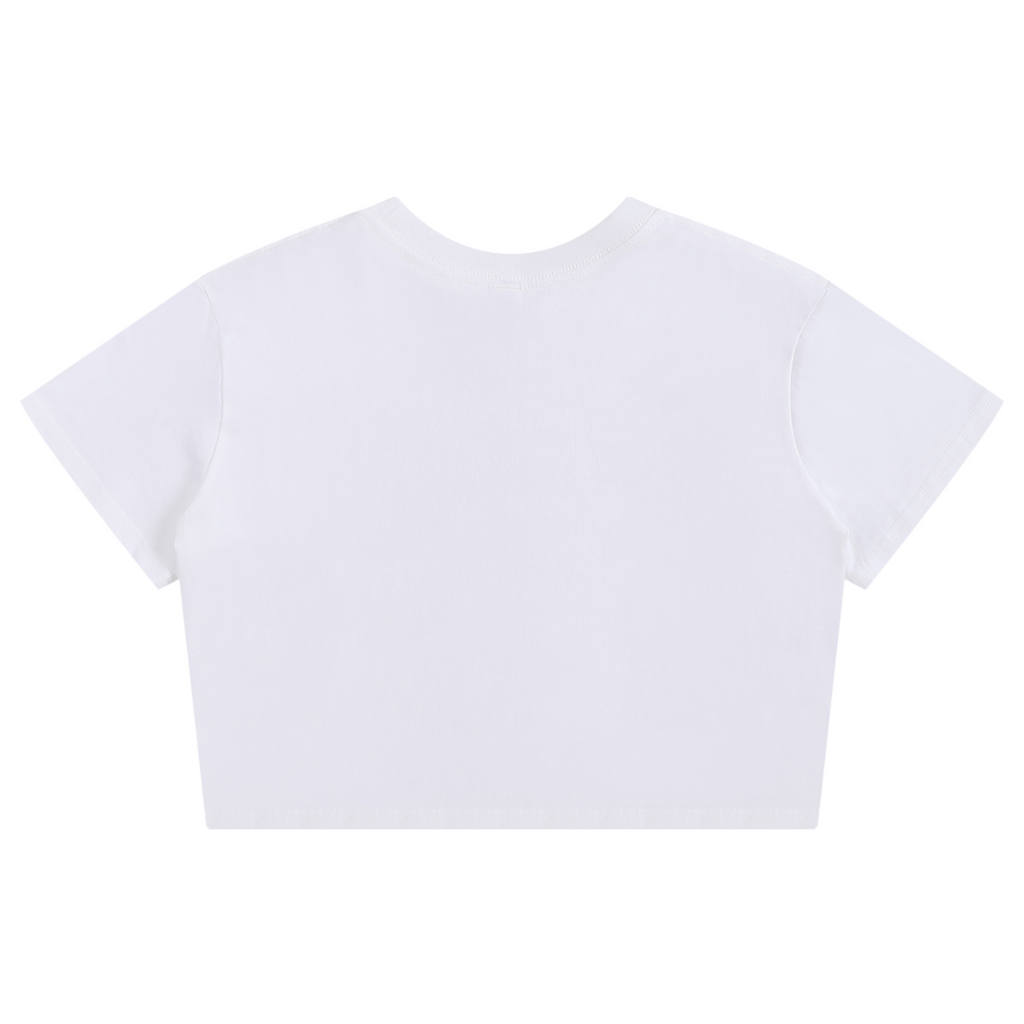 Shop the Teddy Blaze Signature Seamless Baby Tee, a cropped 100% cotton women’s tee featuring the house’s colorful AfroBohemian patchwork wordmark.