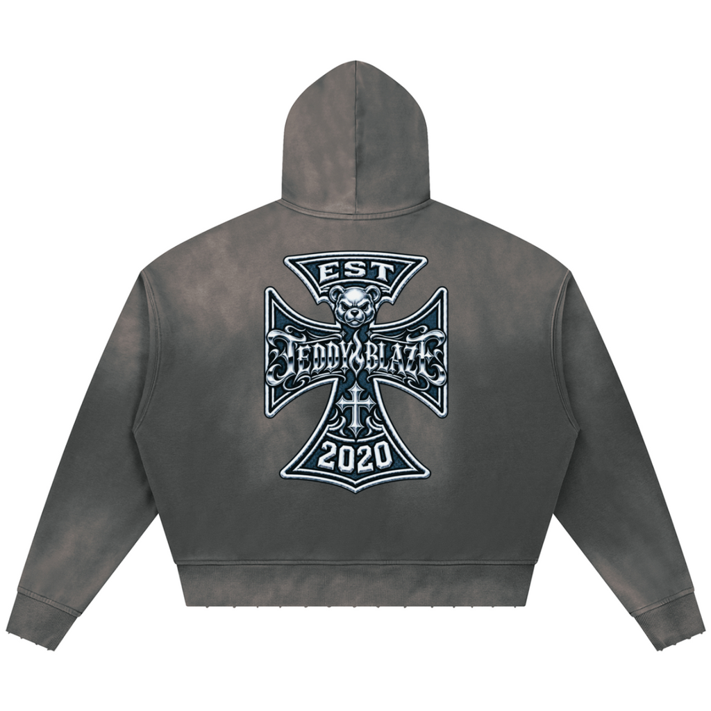 Shop the Fuego Cruz Sunfade Distressed Pullover Hoodie by Teddy Blaze. Heavyweight 370 gsm sunfade fleece hoodie featuring distressed hems, side welt pockets, and the DaCruz back crest.