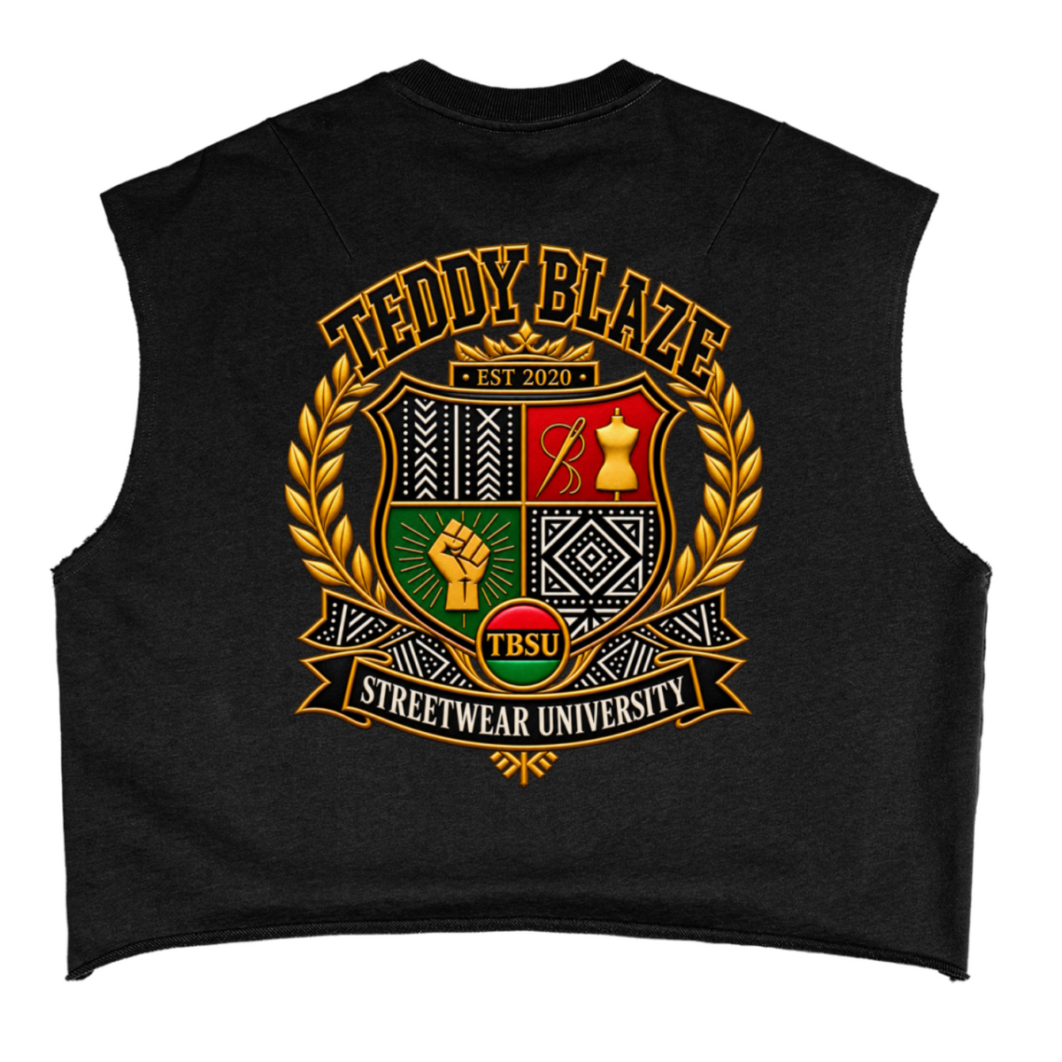 A black sleeveless crop top featuring a large, detailed graphic on the front. The graphic displays a gold laurel wreath framing a four-quadrant crest with red, green, black, and gold details, topped with the text 'TEDDY BLAZE EST 2020' and a banner reading 'STREETWEAR UNIVERSITY'.