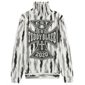 Shop the Suburban Tundra Ribbed Knit Fleece Turtleneck Sweater by Teddy Blaze. Heavyweight 280g/m² Hacci fleece sweater with a skull crest and feather print.