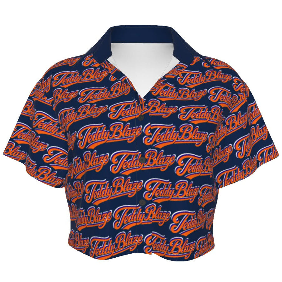 A cropped camp shirt with an allover Signature pattern, short sleeves, V-neck button front, and lightweight stretch fabric for BK summer styling.